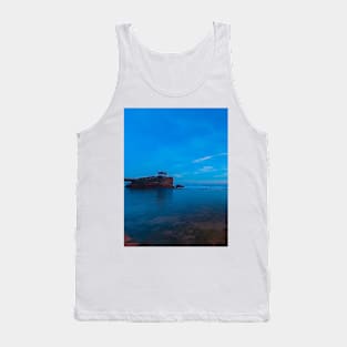 A rock stack creeping out of the blue ocean Tank Top